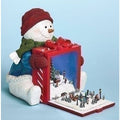 Red and White Pre-Lit Musical Snowman Holding Gift Rotating Train Christmas Tabletop Decor A493